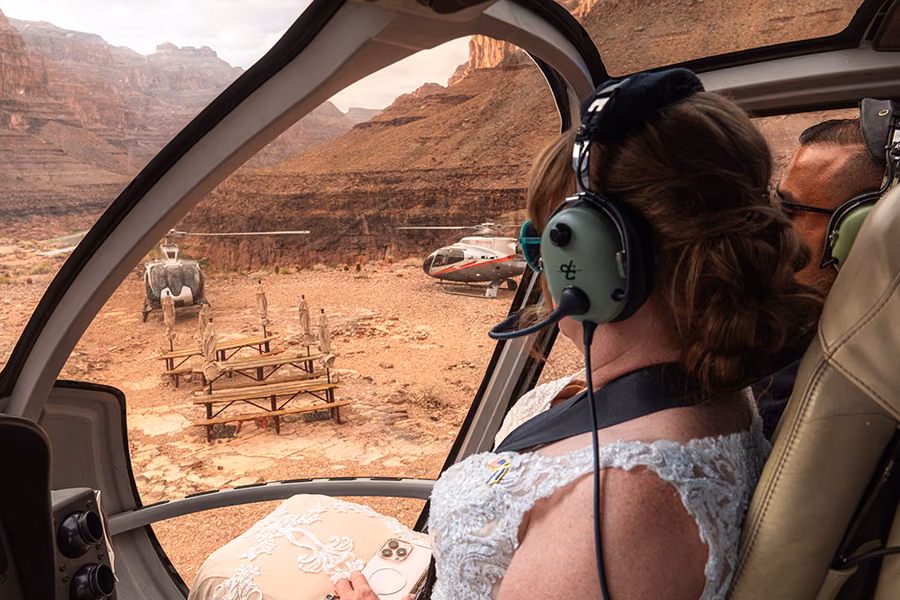 Helicopters at the Grand Canyon landing site for a Las Vegas helicopter wedding