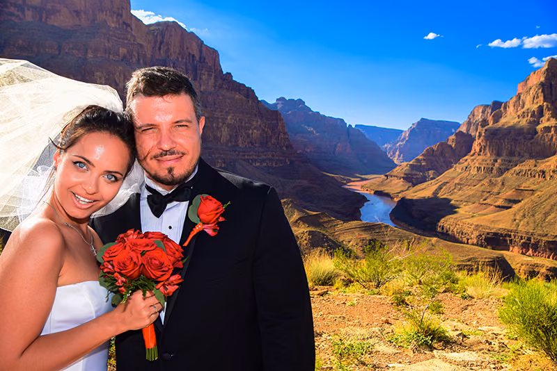 Bride and groom portrait with the Grand Canyon in the background