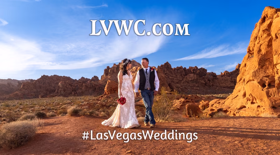 Bride and groom walking hand in hand through Valley of Fire State Park, Nevada