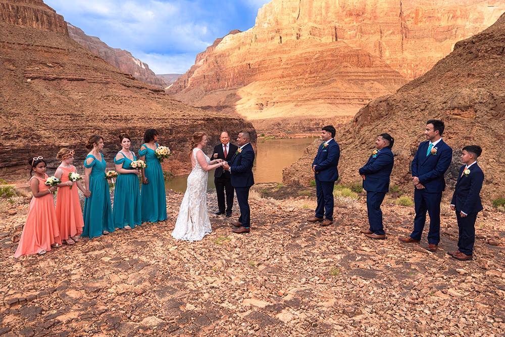 Large wedding group at Grand Canyon helicopter landing site below the rim