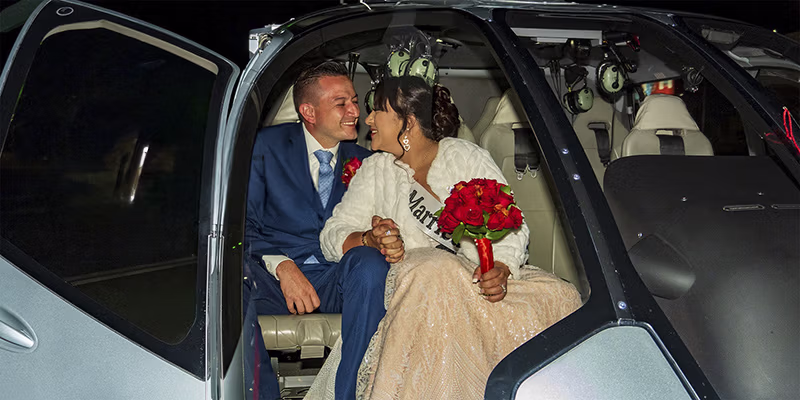 Couple exchanging vows inside helicopter over Las Vegas Strip